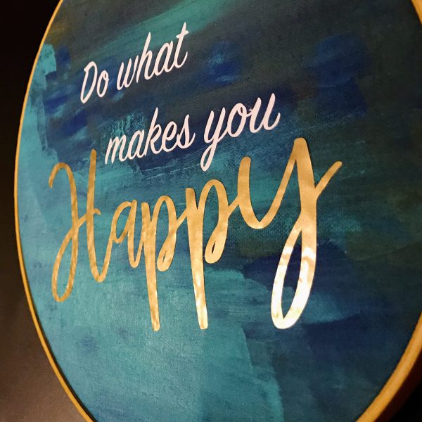 Glimmering Gold lettering on inspirational hoop art piece